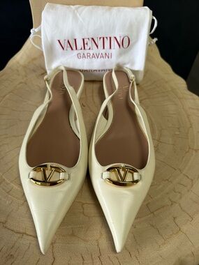 Valentino Garavani Ivory Pointed Slingback Flats with Gold Logo Accent